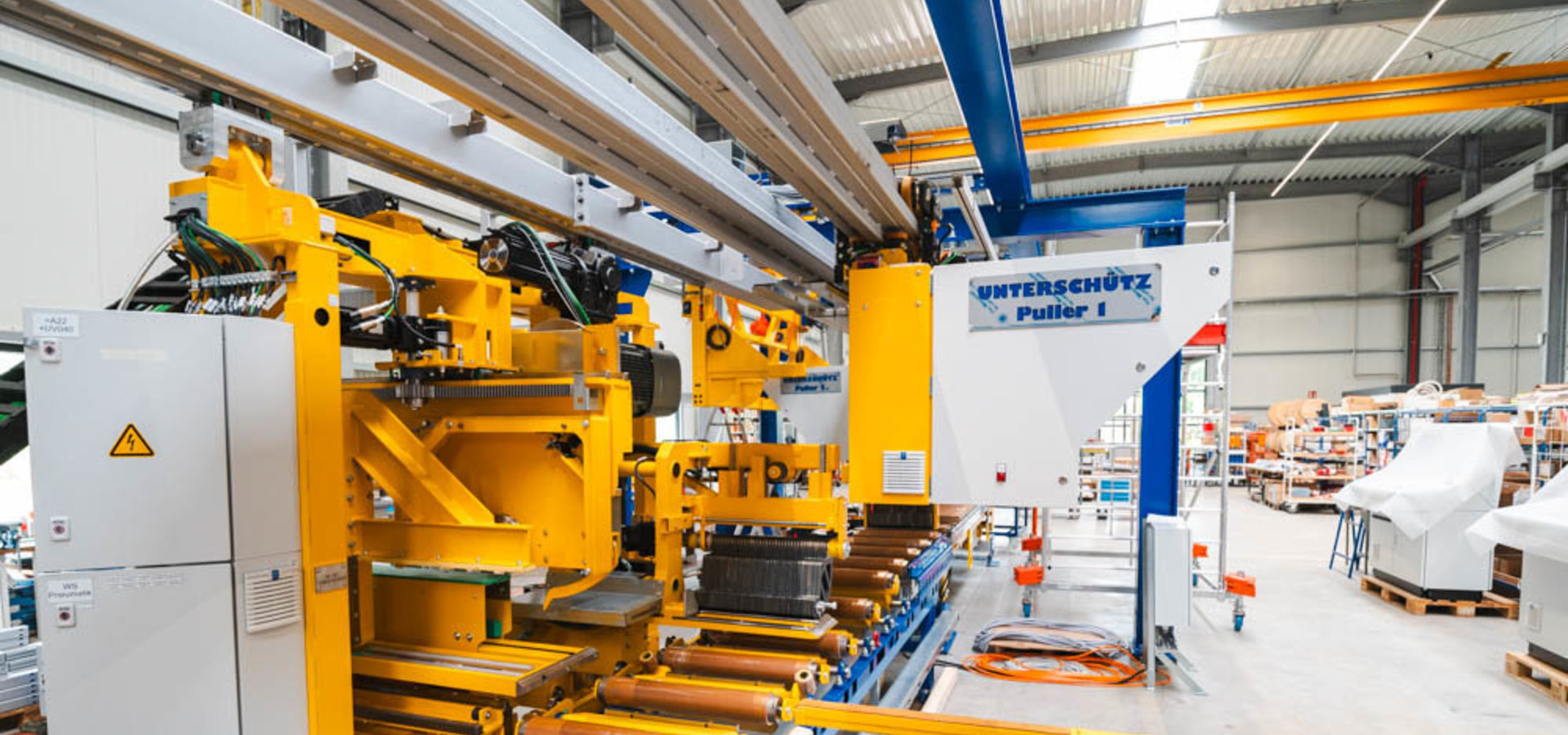 Ausschnitt einer Strangpresslinie von Unterschütz mit Pullersystem im Zentrum